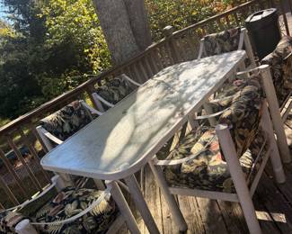 Patio table and chairs with custom cushions. Seth does need good power washing, but is in otherwise beautiful shape.