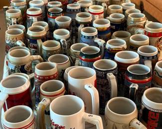 LOTS OF BUDWEISER STEINS