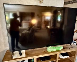 72” Smart TV with cabinet.