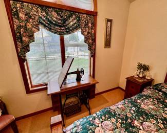 Antique treadle sewing machine & caninet