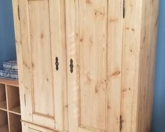Rubbed pine armoire.