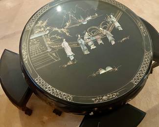 Black Lacquer coffee/tea table w/ nesting stools with stunning garden scene.