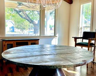 Metal distressed 72” round table. Comes apart into 2 pieces. Bought from The Findery, in Waco TX