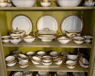 This shows the same set of china (different pieces) and the second of two matching china cabinets. 