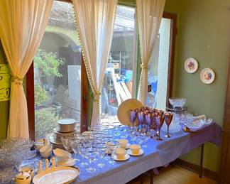 The sale has more stemware and dishes available for sale.  I would not ignore the curtains either.