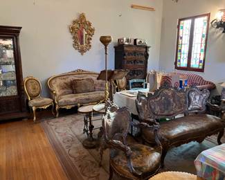 This living room picture is a nice overview of the sofas and chairs in the sale.  