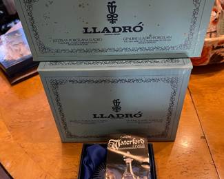 This is the evidence of Waterford crystal existing in the sale, as well as two Lladro figurines.  We'll leave it to your imagination which figures are in the boxes.