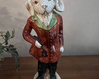 Vintage Staffordshire-style anthropomorphic hunting dog figurine