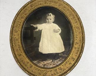 Antique Photograph in Ornate Oval Frame