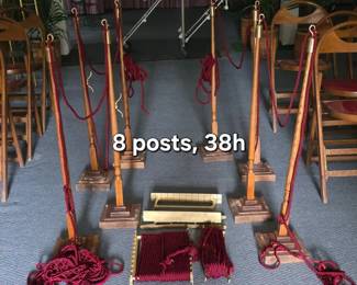 Set of vintage stanchions with square bases, brass-colored finials and red roping