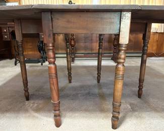 Antique gateleg drop-leaf table
