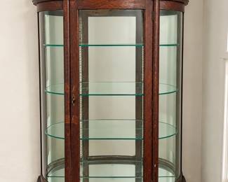 Antique curved glass mahogany china cabinet