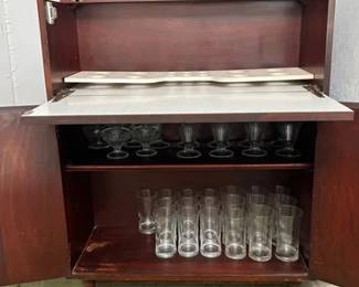 Mid century modern drop front bar cabinet, opened