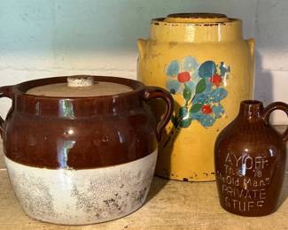 Vintage stoneware crocks and a novelty decanter