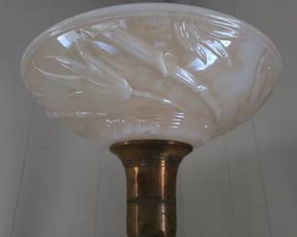 Embossed shade on a vintage floor lamp