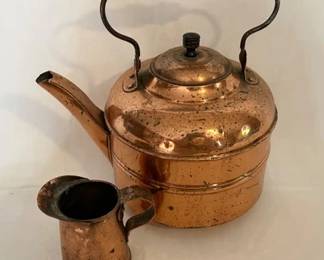 Vintage solid copper tea kettle with wooden handle and copper creamer pitcher