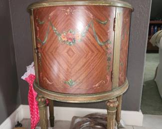 Painted demilune cabinet
