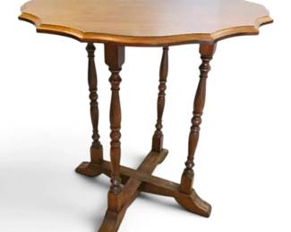 Vintage Wood Accent Table With A Scalloped Edge Top