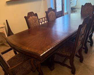 Wooden dining room table and matching chairs | Wildflower Lane Estate Sales | Sugar Land, TX