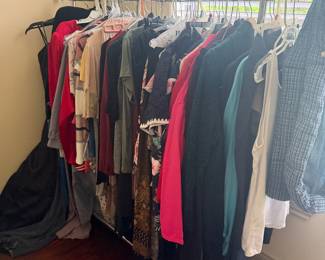 Women's clothing, jackets, tops and wardrobe accessories on hanging rack | Wildflower Lane Estate Sales | Kingwood, TX