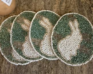 Green and white rabbit-themed decorative coasters and seasonal collectibles | Wildflower Lane Estate Sales | Sugar Land, TX