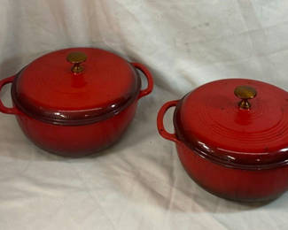 Lot 69: Two Red Enameled Cast Iron Dutch Ovens with Lids