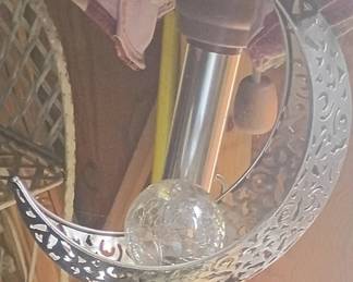 Metal crescent-moon globe decor