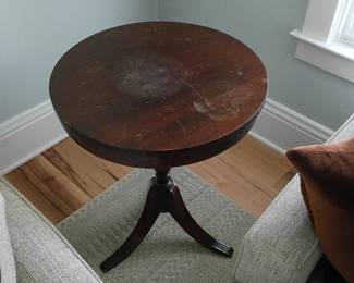 Round wooden side table