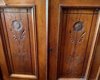 Intricate carving on the hall tree