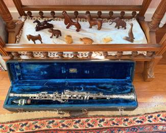 Wooden carved animals; vintage clarinet