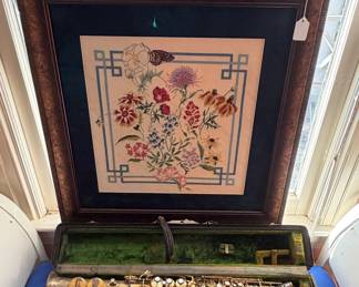 Vintage instruments and needlepoint