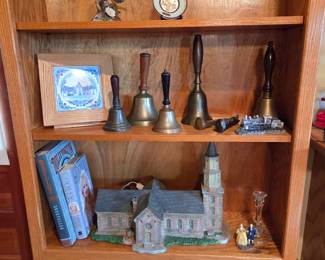 There's 5 antique brass teachers hand bells