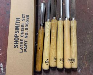 Shopsmith 6-piece lathe chisel set, part no. 505586, with light wood handles and original packaging box.