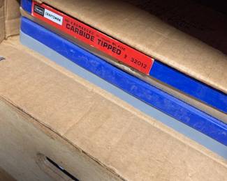 Vintage Sears Craftsman 10-inch Kromedge 30-tooth carbide tipped saw blade in original blue plastic case.