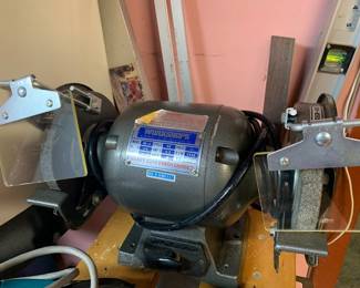 Workshops brand 6-inch heavy duty bench grinder, model BB-13, with clear eye shields.