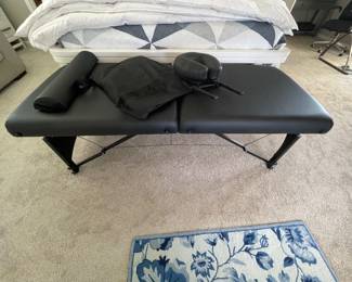 Folding massage table