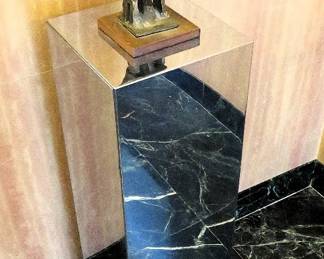 Polished steel pedestal