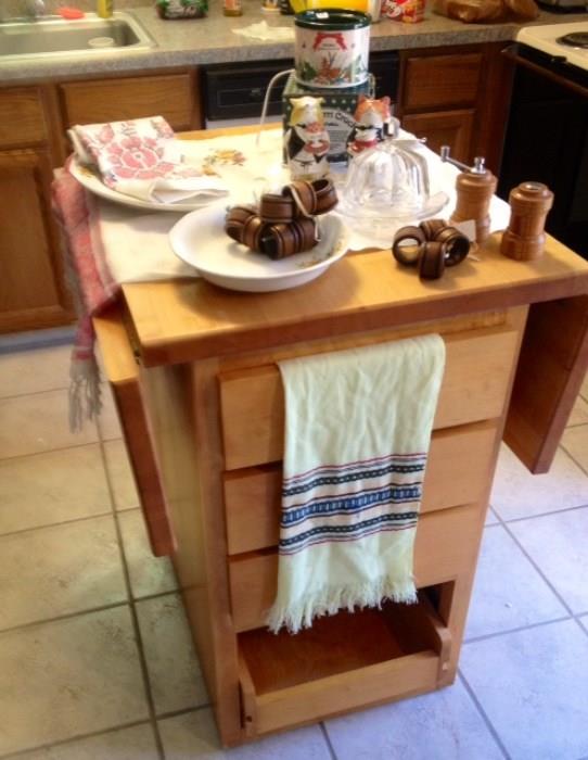 Vintage Linens and Kitchen Items atop the Butcher Block Island