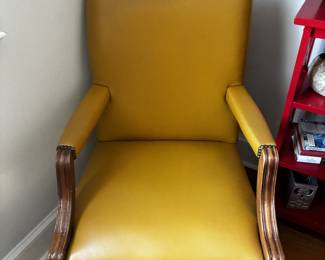 Quality St. Timothy Chair Co. armchair from Hickory, North Carolina, featuring warm mustard/gold upholstery, exposed wood arms and legs, and nailhead trim. A substantial accent chair with classic style and a comfortable presence.