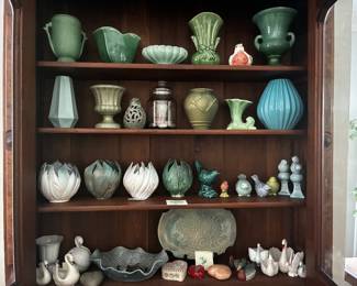 Collection of decorative pottery and ceramic pieces in green, blue, white, and neutral tones, including vases, vessels, birds, and sculptural forms. Individual pieces are being sold separately unless otherwise marked.