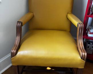 Quality St. Timothy Chair Co. armchair from Hickory, North Carolina, featuring warm mustard/gold upholstery, exposed wood arms and legs, and nailhead trim. A substantial accent chair with classic style and a comfortable presence.