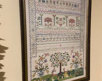 Handmade needlepoint framed.