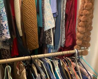 Two closets full of women’s clothing