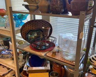 Pottery, wood, and metal decor.