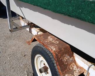 17 foot Newman boat with Johnson 100 outboard motor in good condition