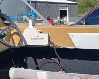 17 foot Newman boat with Johnson 100 outboard motor in good condition