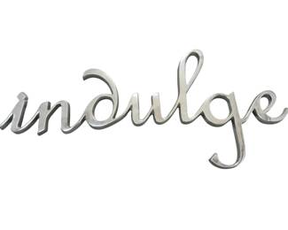Indulge metal badge 