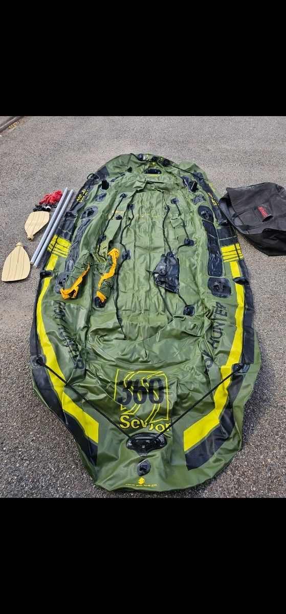 Sevylor Fish Hunter 360 Inflatable Fishing Boat Spacious inflatable fishing boat, ideal for fishing trips, lake outings, and outdoor recreation. Features a durable inflatable design with room for multiple passengers. Includes: 2 paddles Carrying bag Additional accessories shown in photos Portable and easy to transport and store when deflated. Pre-owned. Inflation and air retention have not been tested. Sold as-is. See photos for included accessories and condition.