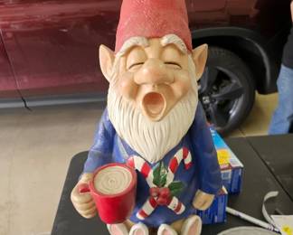 Decorative Garden Gnome Colorful garden gnome figurine holding a coffee cup.