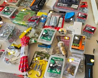 Hardware, Tools & Home Improvement Supplies  Assorted screws, nails, bolts, fasteners, drill bits, electrical supplies and miscellaneous hardware. New and pre-owned items.